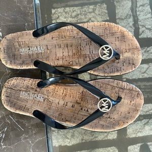 Michael Kors black slippers/ flip flops